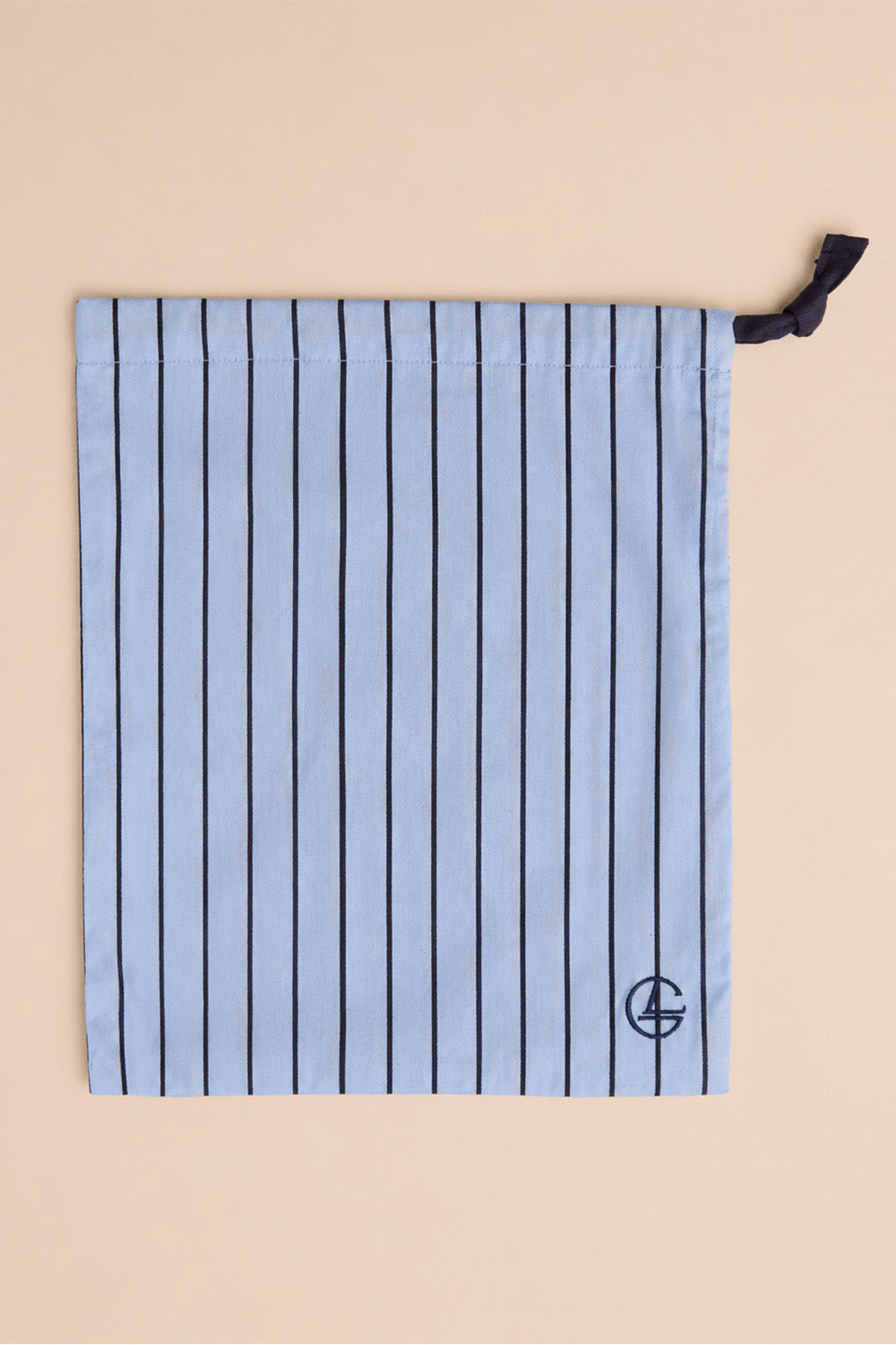 Willow Cotton Stripe PJ Set in Blue shown with its matching blue striped drawstring bag