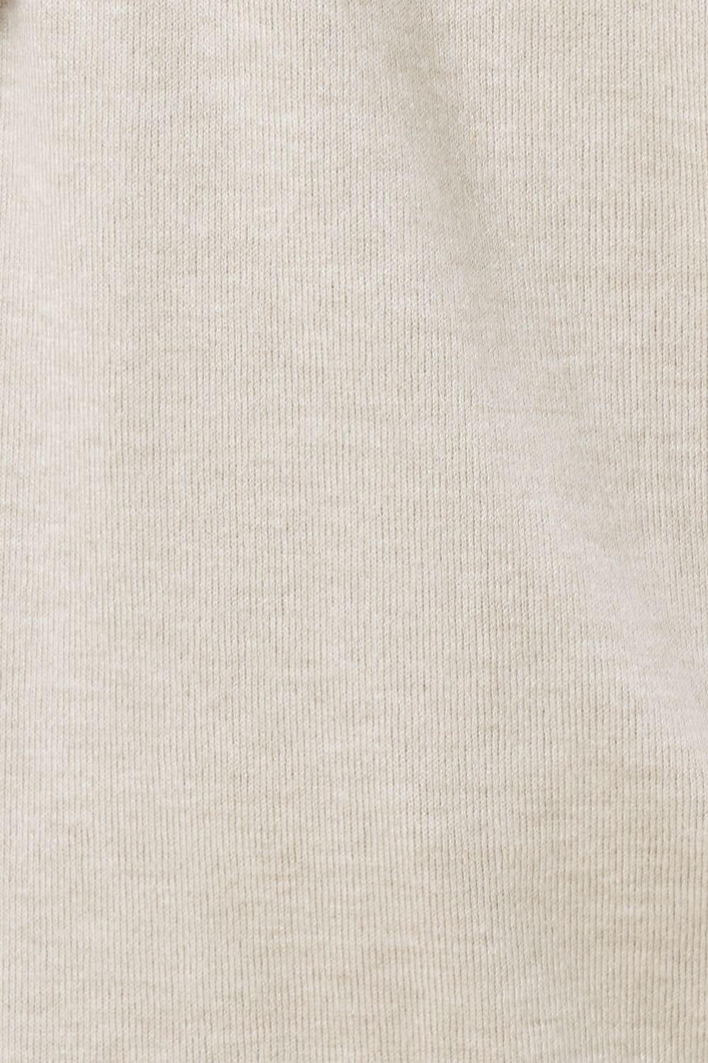 Close-up of beige fabric texture