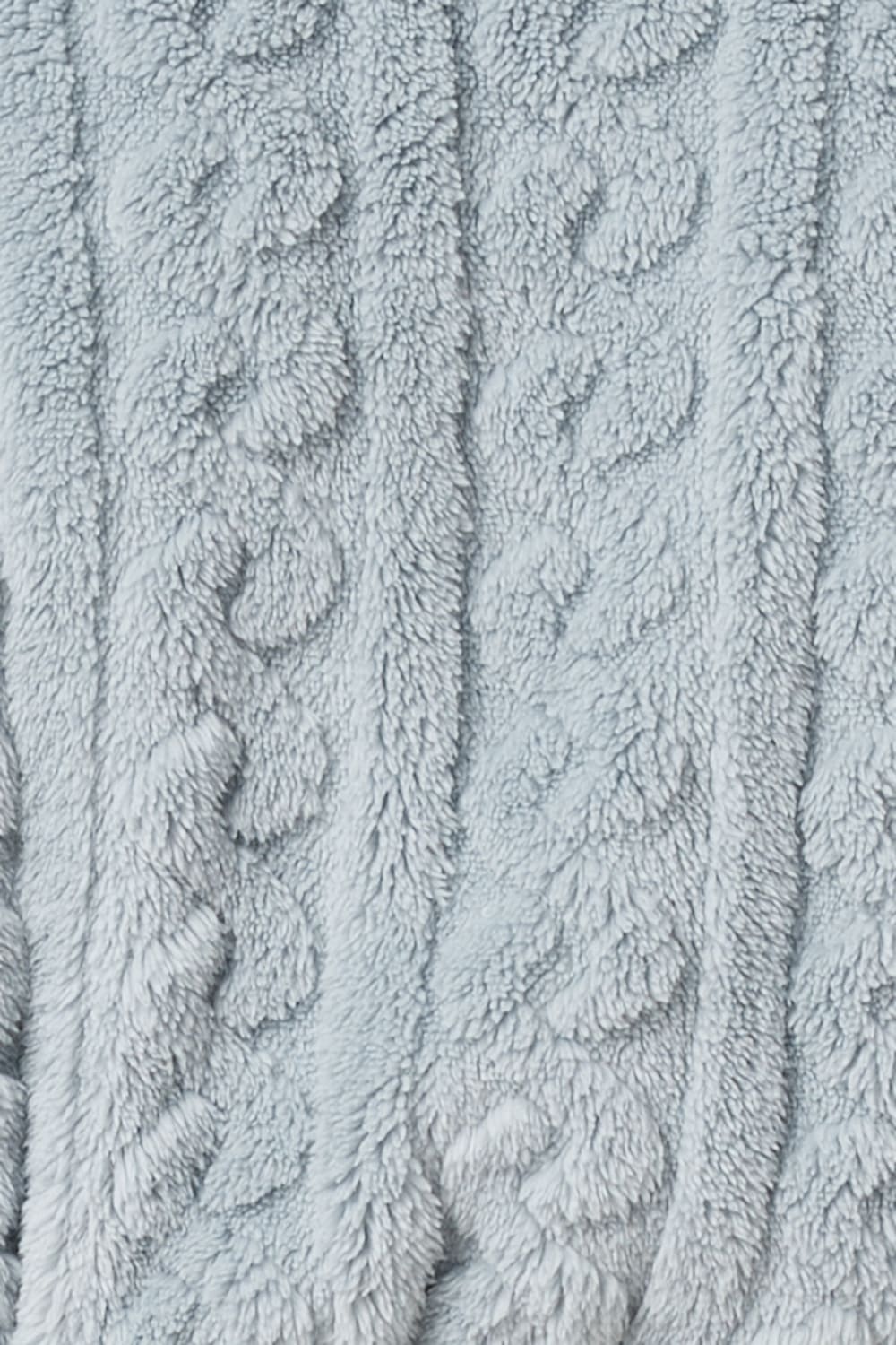 Close-up of textured light blue fabric with cable knit of the Gabriella Plush Long Robe