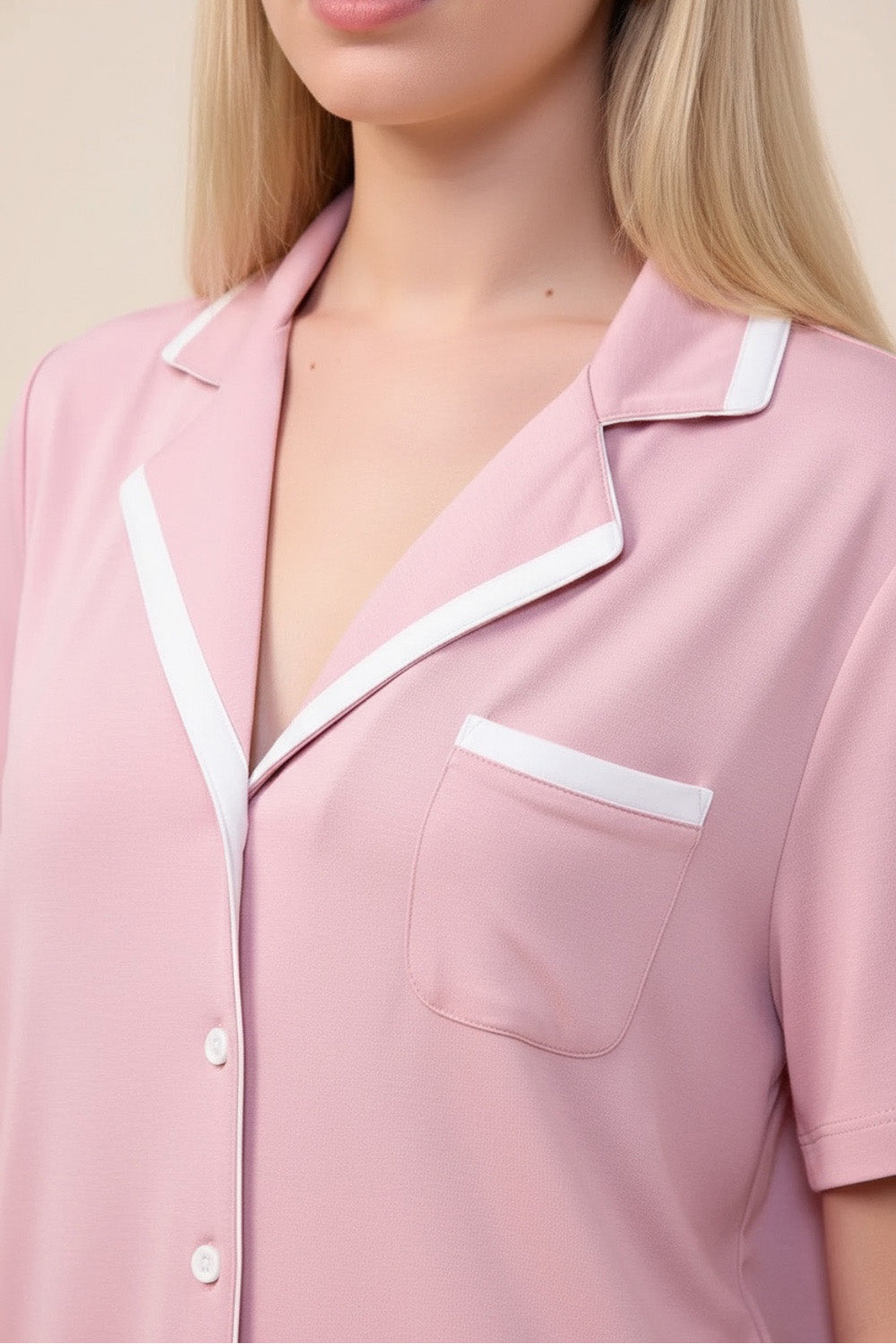 Close-up of the Allegra Short Bamboo PJ Set in Pink, showing the camp collar and pocket with white contrast trim