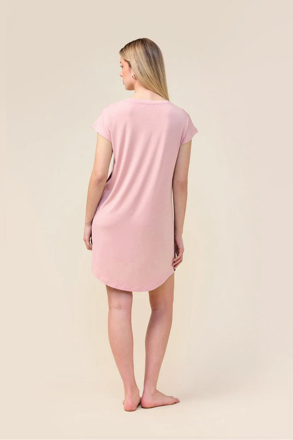 Woman wearing the Ashley Bamboo Sleep Tee in Pink, back view