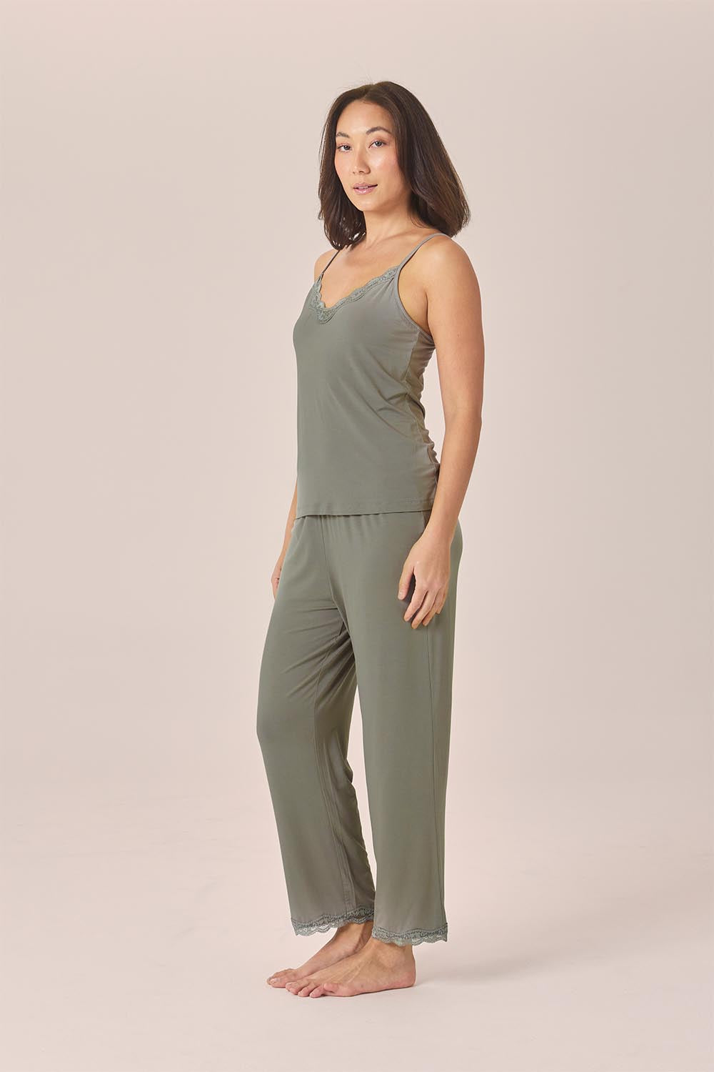Woman wearing the Britt Bamboo Lace Cami Long PJ Set in Olive, front view