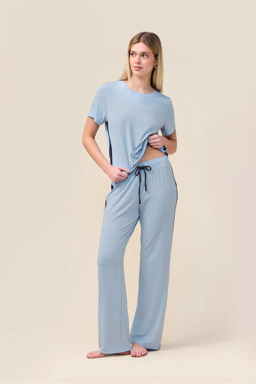 Woman wearing the Inez Bamboo Pant with Stripe in Blue, front view