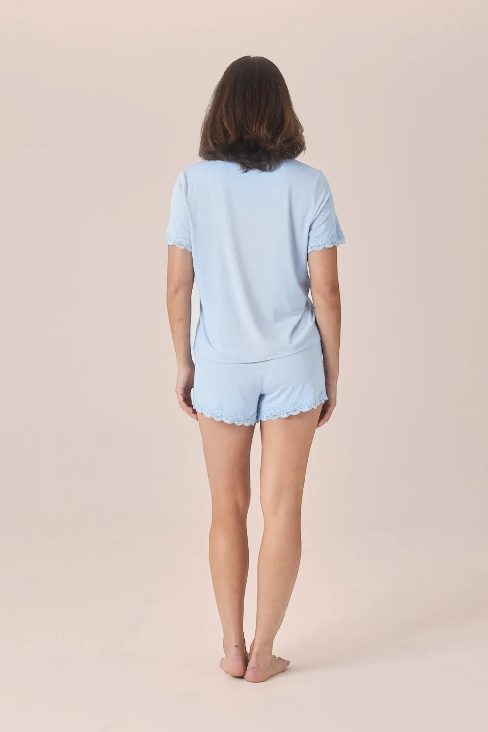 Woman wearing the Joni Bamboo Short Set with Lace in Blue, back view