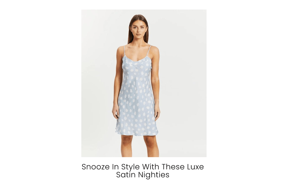 Woman wearing a blue satin nightie with white polka dots from Gingerlilly Sleepwear