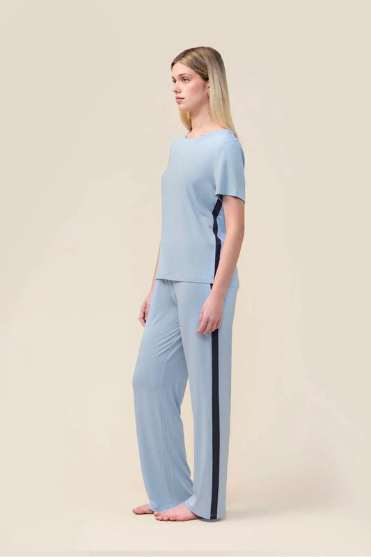Woman wearing the Bronte Bamboo T-Shirt with Stripe in Blue, side view