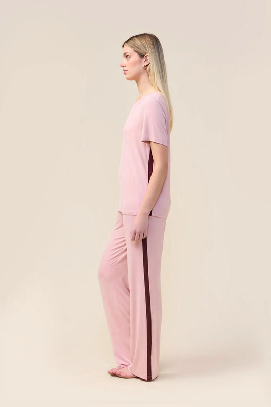Woman wearing the Bronte Bamboo T-Shirt with Stripe in Pink, side view