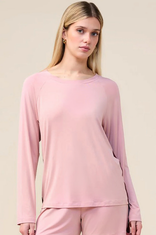 Woman wearing the Solene Long Sleeve Top with Stripe in Pink, close front view