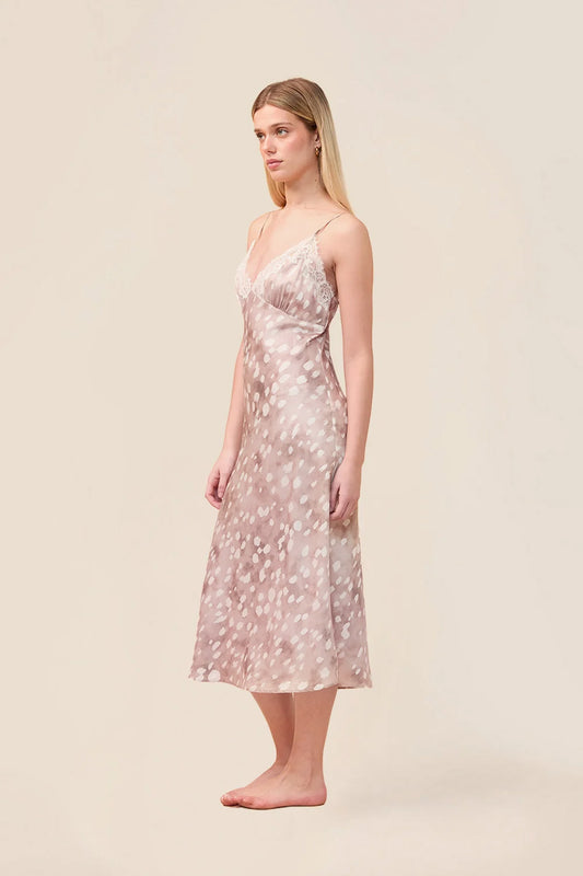 Woman wearing the Melody Bambi Print Spot Nightie in Brown, angled side view
