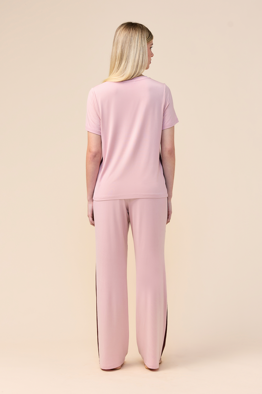 Woman wearing the Inez Bamboo Pant with Stripe in Pink, back view