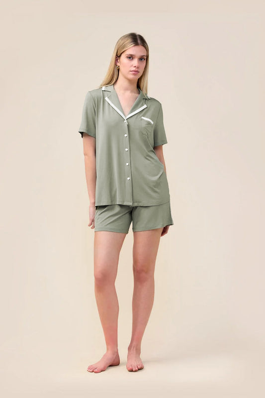 Woman wearing the Allegra Short Bamboo PJ Set in Olive, front view with white contrast trim