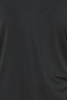 Close up of Anya Bamboo Sporty PJ Set Black fabric showing the smooth bamboo texture and soft black material.