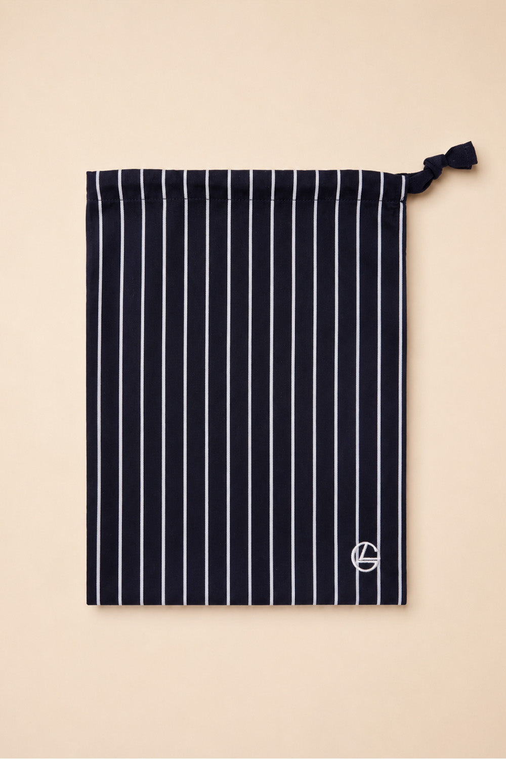 Willow Cotton Stripe PJ Set in Black shown with its matching black striped drawstring bag