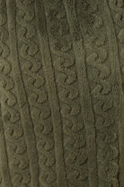 Close-up of textured green olive fabric with a cable knit pattern for the Gabriella Plush Long Robe