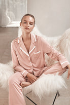 Woman wearing Grace Bamboo PJ Set Pink, soft bamboo pyjama set with contrast piping and relaxed fit