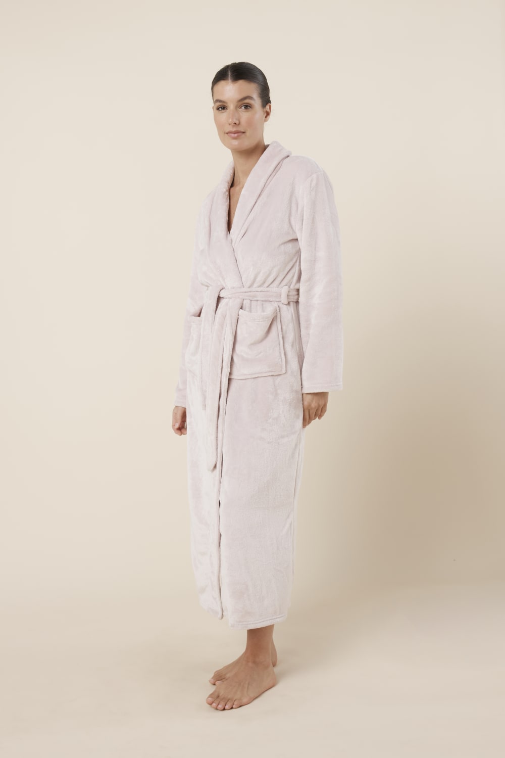 Woman wearing Imogin Pink Plush Robe side view showing relaxed maxi length silhouette