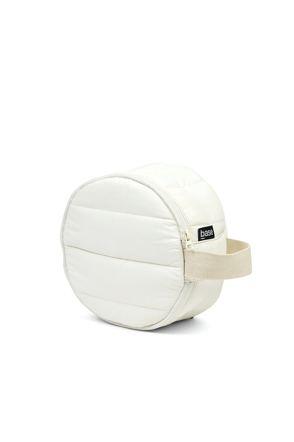 Ecru quilted round toiletry bag with zipper and beige handle, Base label visible