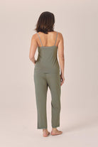 Woman wearing the Britt Bamboo Lace Cami Long PJ Set in Olive, back view