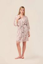 Woman wearing the Hadley Bambi Print Robe in Brown, front view with tie waist