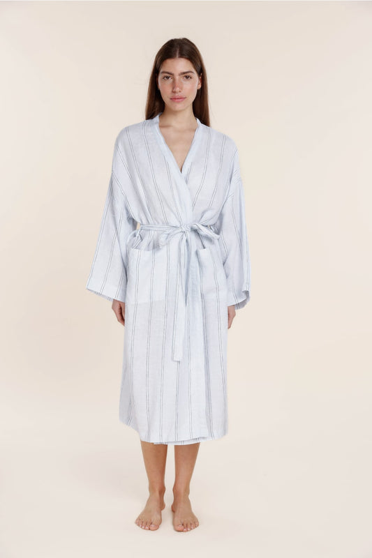 Woman wearing a Gingerlilly blue striped cotton robe, front view, relaxed sleepwear style