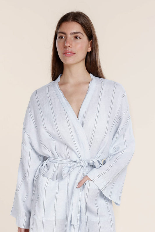 Woman wearing Gingerlilly Sleepwear blue striped cotton robe with waist tie