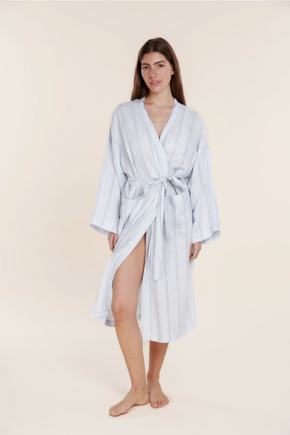 Woman wearing Gingerlilly Sleepwear blue striped cotton robe, front view